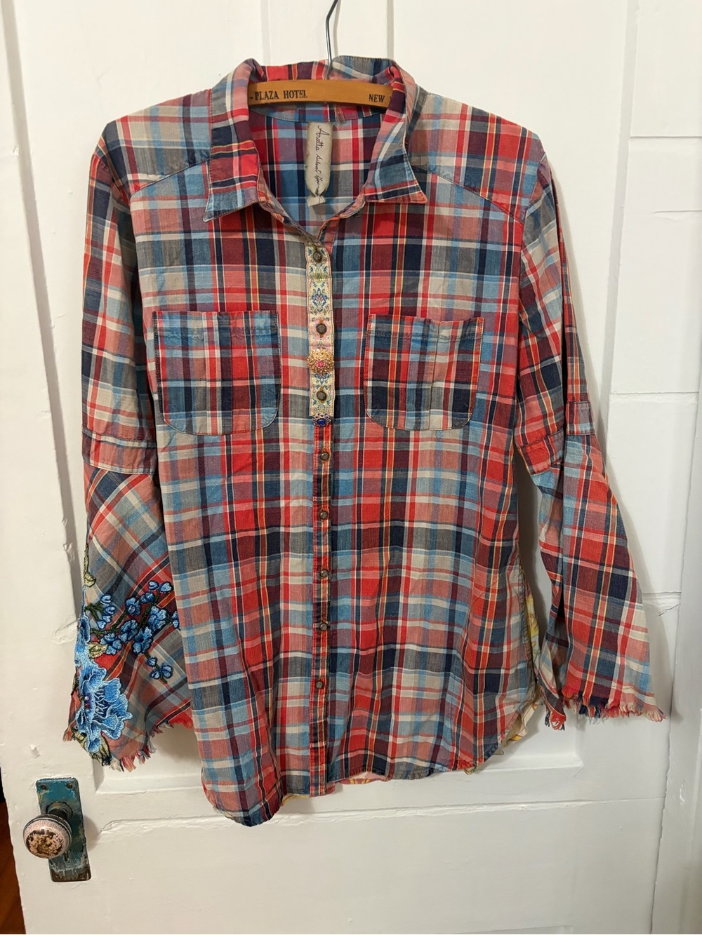 Aratta Silent Journey
Plaid Blouse with Floral Accents and Bell Sleeves